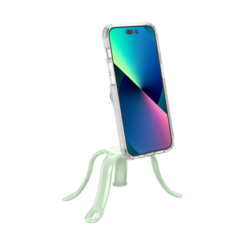 PopSockets Flex Mount in Honey Dew color holding a smartphone with a colorful screen in a clear case. The mount's flexible legs are positioned to support the phone upright on a flat surface. The phone is shown from the front, highlighting the screen and the mint-green colored flexible mount's design.