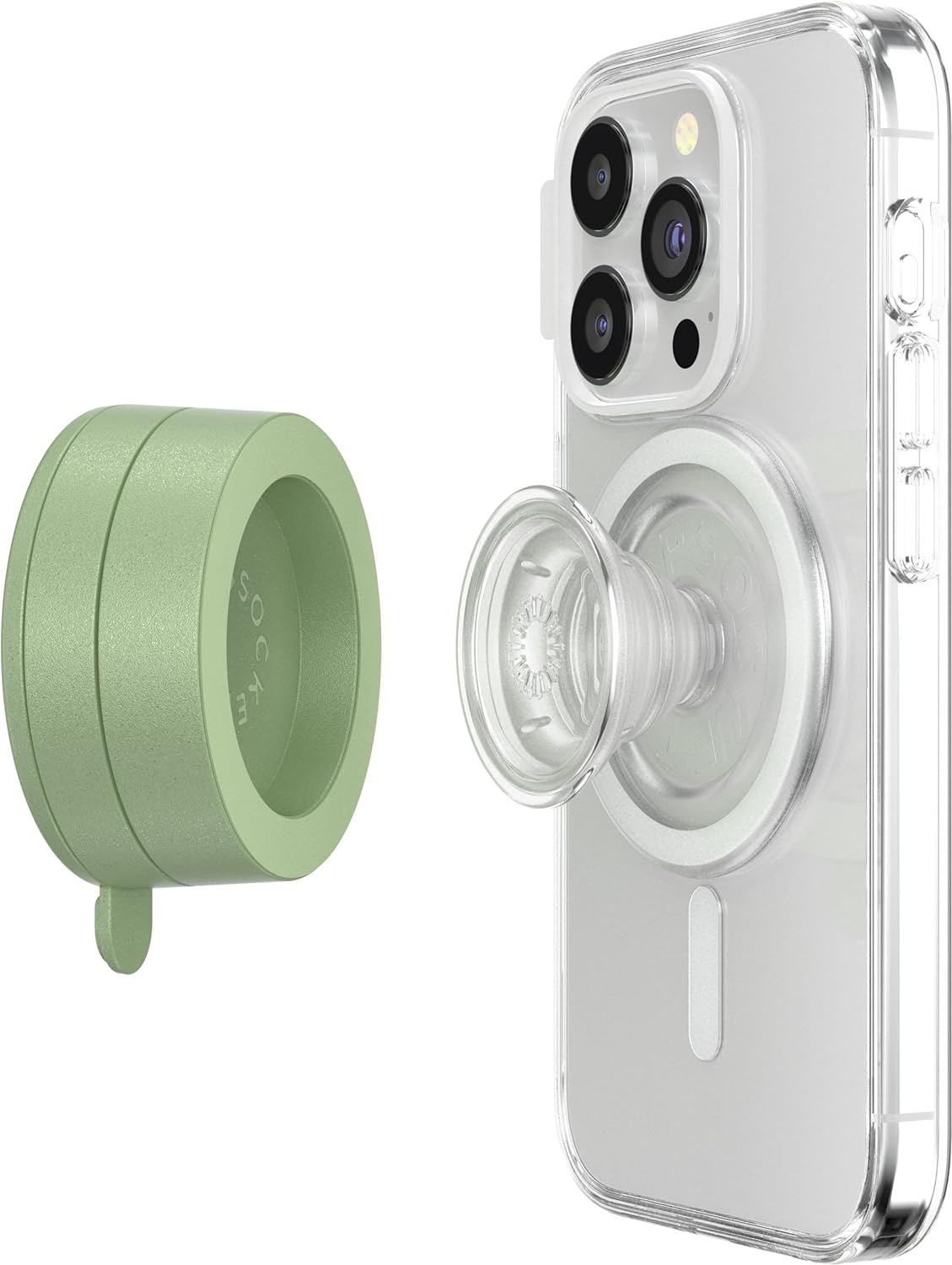 A smartphone with a clear case is shown with an attached clear PopSocket grip, and an eucalyptus green PopSockets Suction Mount for MagSafe positioned beside it. The phone's back displays the MagSafe alignment ring, highlighting its compatibility with MagSafe accessories. The eucalyptus green mount, shown separately, demonstrates its circular design and fresh color. The clear PopSocket grip is expanded, illustrating its functionality for easy handling of the phone.