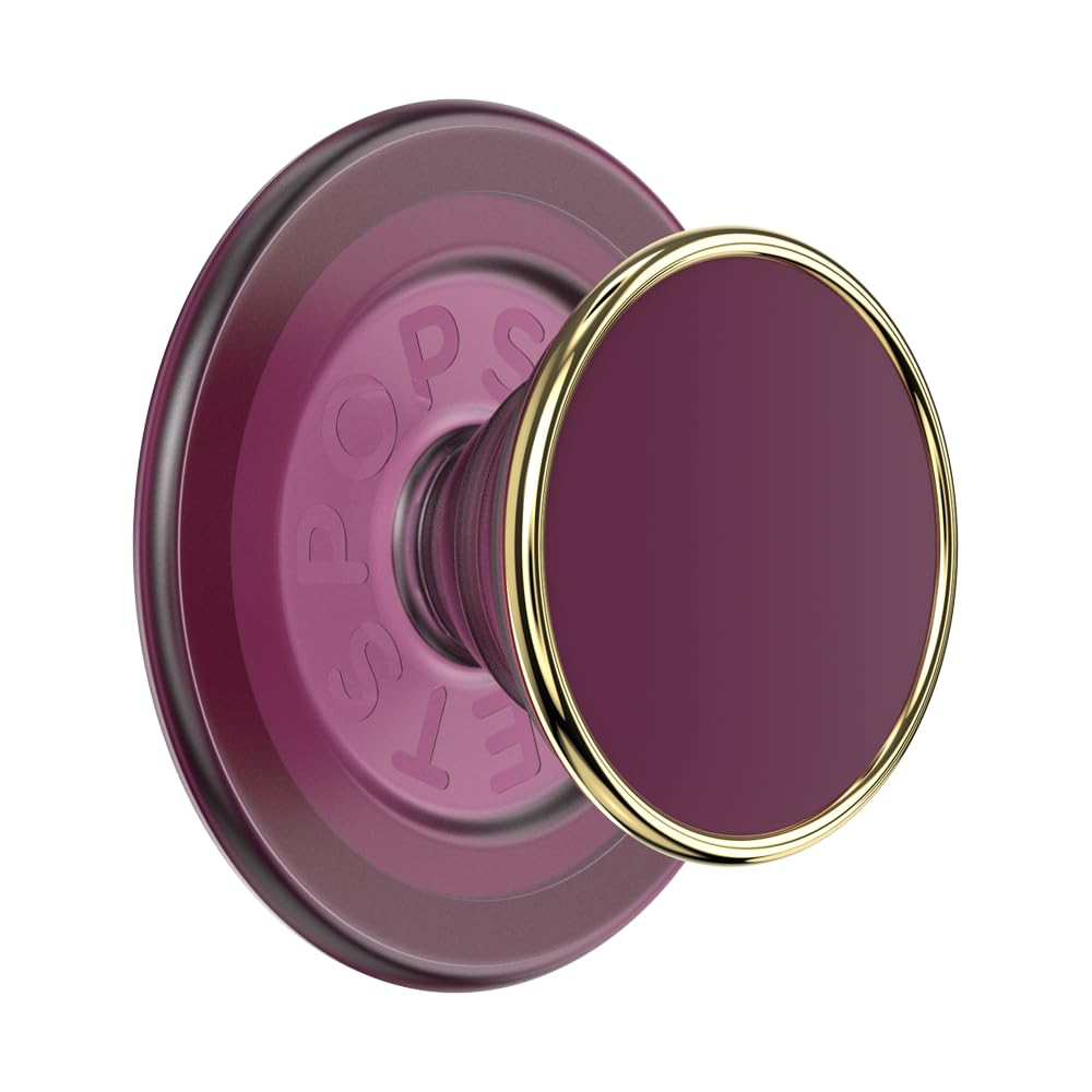 A close-up of a PopSocket grip with a deep maroon base and a glossy circular top accented by a gold metallic rim, offering a stylish and luxurious design for secure phone handling and stand functionality.