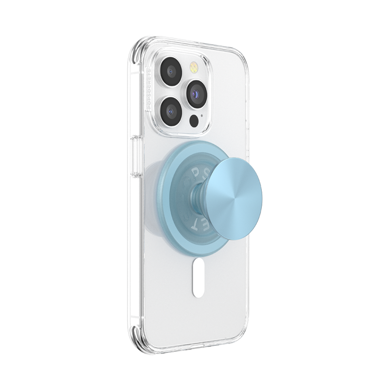 A smartphone with a clear case is shown with a PopSockets MagSafe PopGrip in blue sigh color attached to its back. The PopGrip is extended, showcasing its functional grip, with a glossy, slightly reflective soft blue surface. The phone's camera lenses are visible at the top, highlighting the PopGrip's sleek and modern design, which complements the phone's aesthetics while providing a practical grip for easier handling.