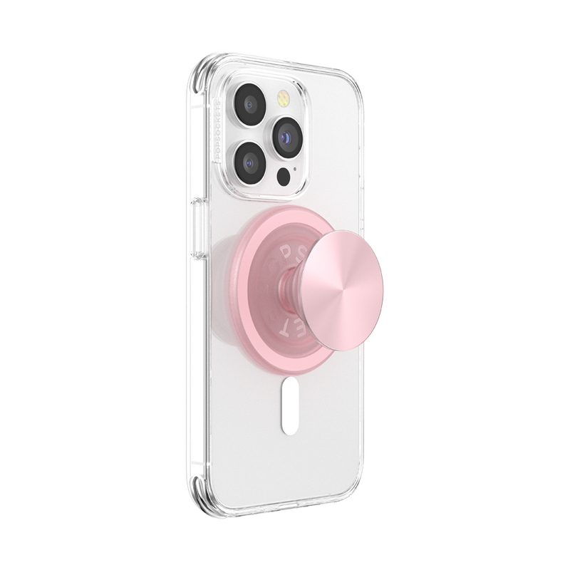 A smartphone with a clear case is shown with a PopSockets MagSafe PopGrip in dusty rose color attached to its back. The PopGrip is extended, showcasing its functional grip, with a glossy, slightly reflective soft pink surface. The phone's camera lenses are visible at the top, highlighting the PopGrip's sleek and modern design, which complements the phone's aesthetics while providing a practical grip for easier handling.