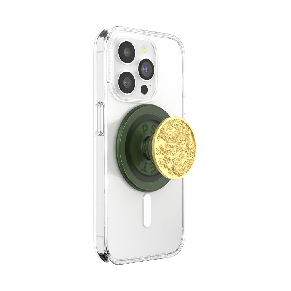 A smartphone with a clear case featuring an extended green pop-up grip with a gold dragon design, blending elegance and practicality for secure handling and versatile stand functionality.