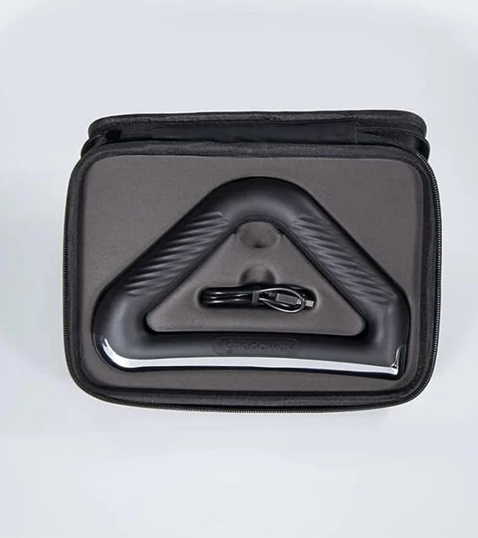 Black and silver ergonomic massage tool neatly placed in a custom-molded storage case with a secure zipper closure. The triangular-shaped tool features a textured grip and an embossed brand name, accompanied by a small accessory secured in the case for added convenience. Ideal for organized storage and portability.