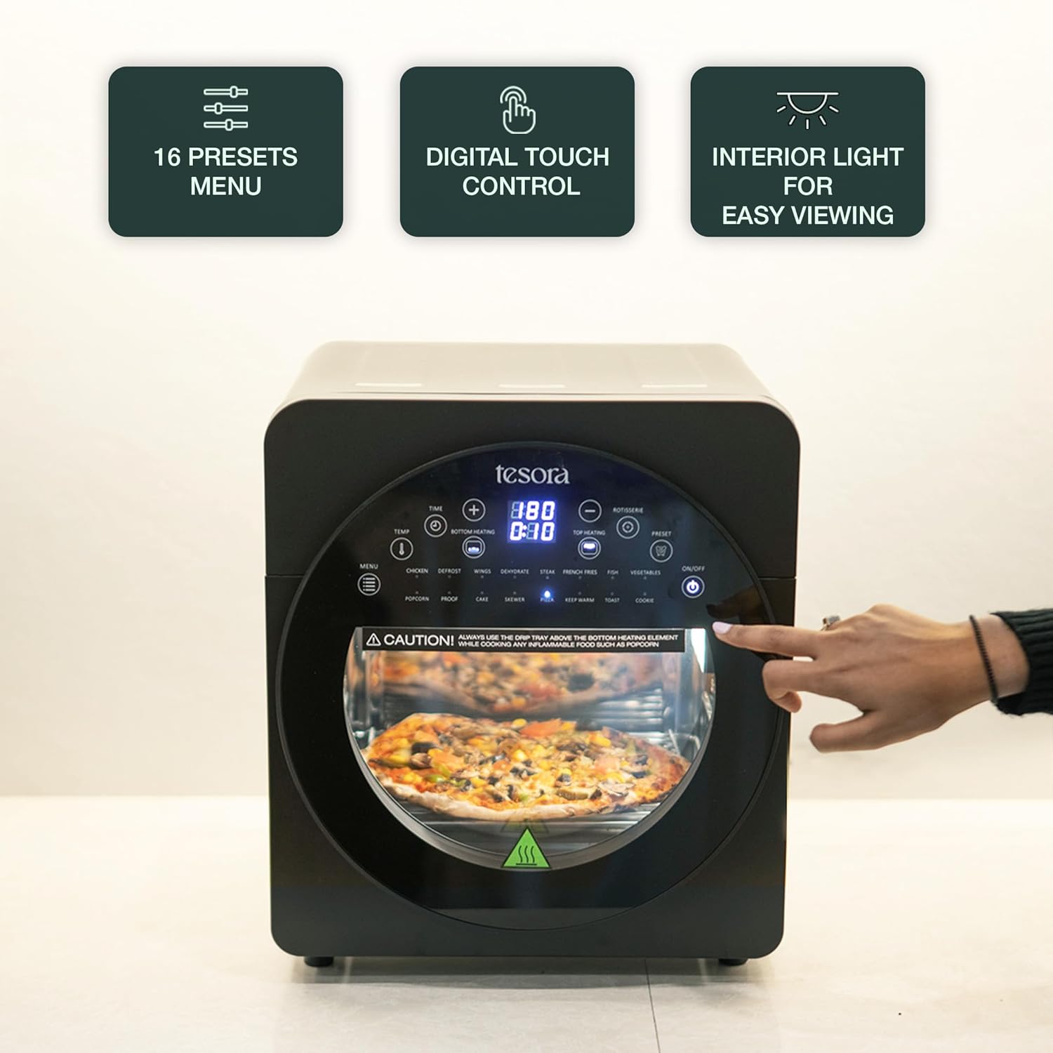 This image features the Tesora air fryer, showcasing its **16 presets menu**, **digital touch control**, and an **interior light** for easy viewing of the cooking process. A hand is seen interacting with the digital control panel, while a pizza is visible inside the air fryer, highlighting its spacious interior and efficient design. The circular digital display and buttons add a modern touch to the product's user interface, emphasizing its ease of use and functionality.