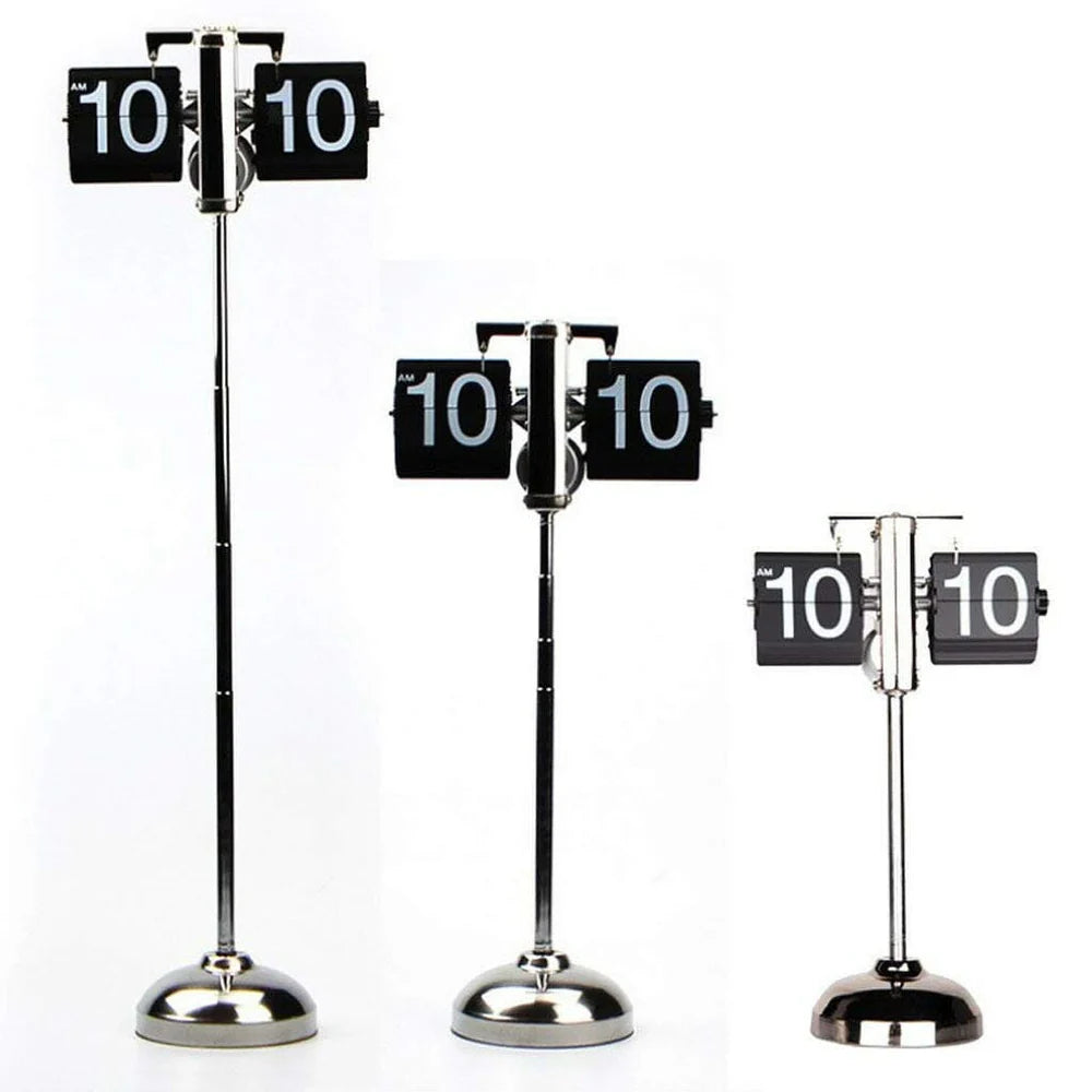  Three vintage-style flip clocks with chrome stands are displayed in a row, each varying in height. The tallest clock on the left, the medium-height clock in the middle, and the shortest clock on the right all display the time "10:10" with black and white flip cards. The clocks have a sleek, retro design, showcasing different sizes while maintaining the same overall aesthetic. The background is plain white, highlighting the clocks as the focal point.