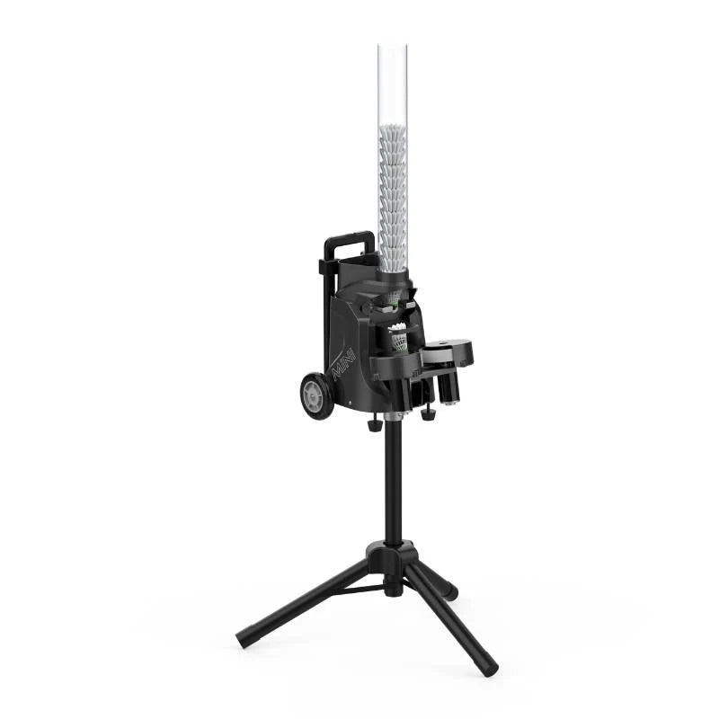 The PUSUN MINI badminton shuttlecock feeder machine is mounted on a sturdy tripod stand, featuring a transparent tube for holding shuttlecocks and designed for precise and efficient shuttlecock delivery.