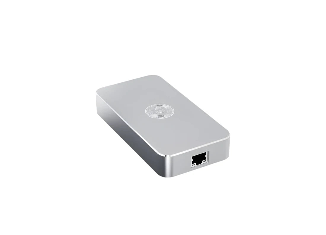 Angled view of the Deeper Connect Mini SE device with a sleek metallic finish, designed for secure and private decentralized internet access in a compact form factor with LAN Port.