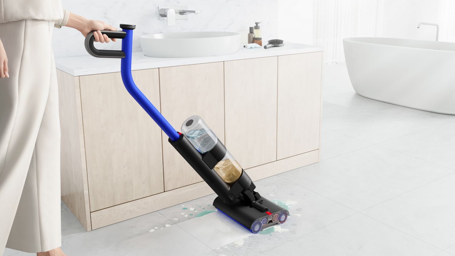 Cordless wet and dry vacuum cleaner, designed for bathroom cleaning, efficiently removing spills and debris with advanced dual-tank technology.