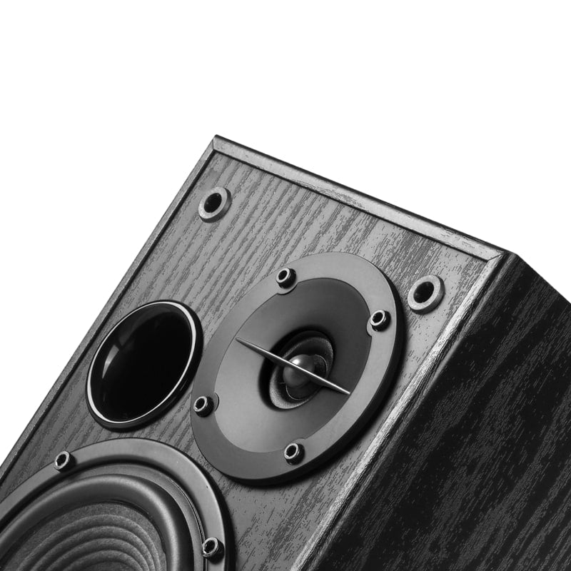 This image shows a close-up of a high-fidelity speaker with a modern design. The speaker cabinet appears to be constructed from wood with a textured finish, emphasizing an elegant yet durable build. The speaker setup includes a well-defined tweeter, surrounded by a ring with securing screws, and a bass reflex port to enhance audio performance. The overall design suggests a focus on delivering a premium listening experience with rich, clear sound.