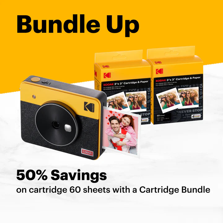 A Kodak C300R instant camera in yellow and black is shown printing a photo, with two packs of Kodak 3” x 3” cartridge and paper in the background, promoting a bundle deal with 50% savings on 60 sheets.