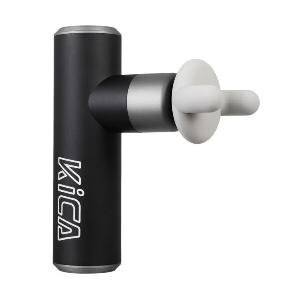A black KICA Mini 2 massager with a white silicone massage head attachment. The device features a sleek, cylindrical metal body with the KICA logo prominently displayed. The massage head is designed for targeted muscle relief, showcasing the product's compact and portable design ideal for personal use.