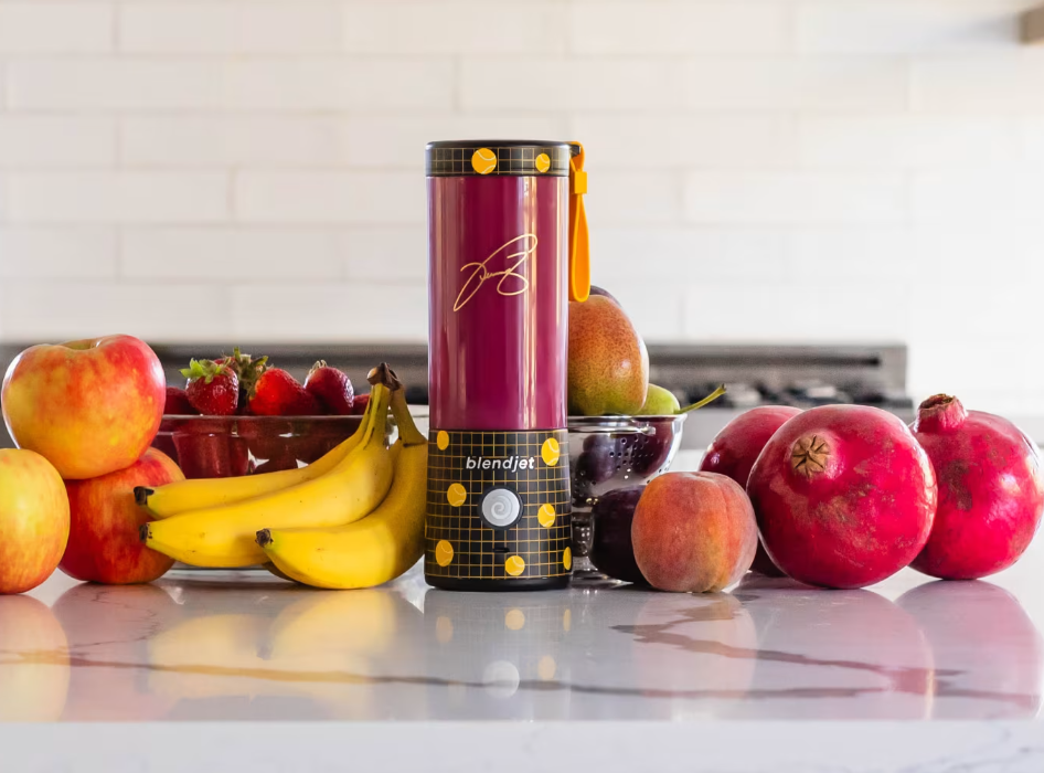 The **BlendJet Special Edition Portable Blender** features a sleek design with a vibrant fruit-themed look, perfect for blending fresh smoothies, juices, or shakes right at your countertop. Compact and stylish, it's ideal for home or on-the-go use!