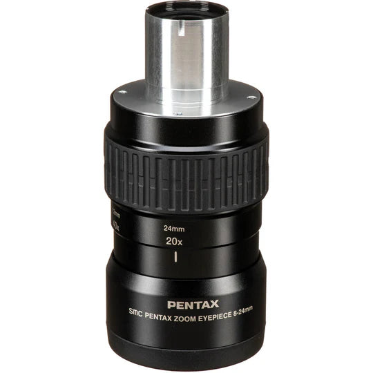 A Pentax SMC Pentax Zoom Eyepiece, featuring a compact and cylindrical black design. The eyepiece has a silver attachment at the top for connecting to a spotting scope. The middle section has a textured grip for easy handling and adjustment.