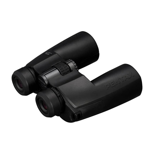  A pair of black Pentax SP 10x50 WP binoculars with a robust, ergonomic design. The binoculars feature large objective lenses and adjustable eyepieces. The central focusing wheel is prominently positioned between the two barrels. The Pentax branding is visible on the side of the right barrel. The binoculars are designed for a comfortable grip and easy handling.