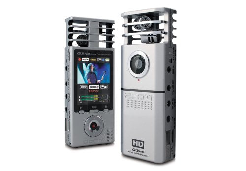 Zoom Q3HD Handy Video Recorder featuring an HD lens and built-in microphones. The image shows the front and back views, highlighting the screen displaying a video recording on the left and the lens on the right.