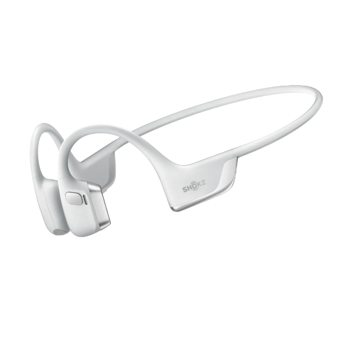 A close-up of white Shokz bone conduction headphones resting on a flat surface, highlighting their sleek wraparound design and smooth matte finish. The headphones feature curved earpieces, integrated controls, and a minimalist aesthetic that emphasizes their lightweight and ergonomic construction.