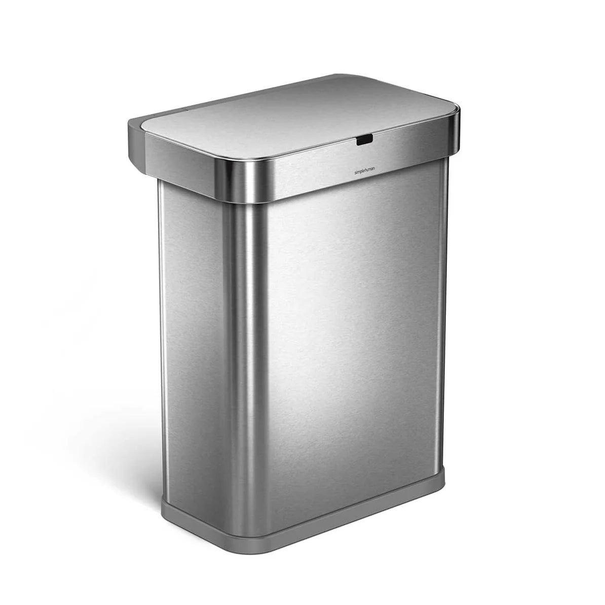 The image shows a Simplehuman trash can with a stainless steel finish, viewed from an angled perspective. The trash can has a sleek, rectangular design with rounded corners, characteristic of Simplehuman’s modern and minimalist aesthetic. The stainless steel body and lid give it a polished, sophisticated look that would complement any contemporary space, such as a kitchen, bathroom, or office.