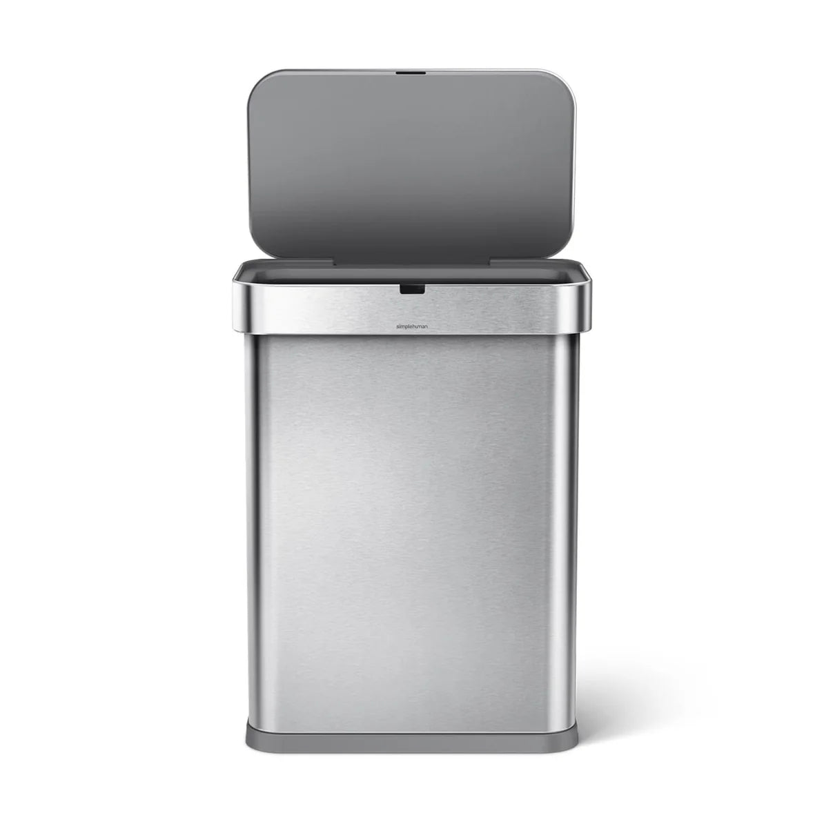 The image shows a Simplehuman trash can with a modern, rectangular design. The trash can is made of brushed stainless steel, giving it a sleek and clean appearance. The lid of the trash can is open, revealing the interior, which is likely designed for easy access and disposal. The overall design emphasizes both functionality and aesthetic appeal, typical of Simplehuman products known for their innovative and user-friendly features.