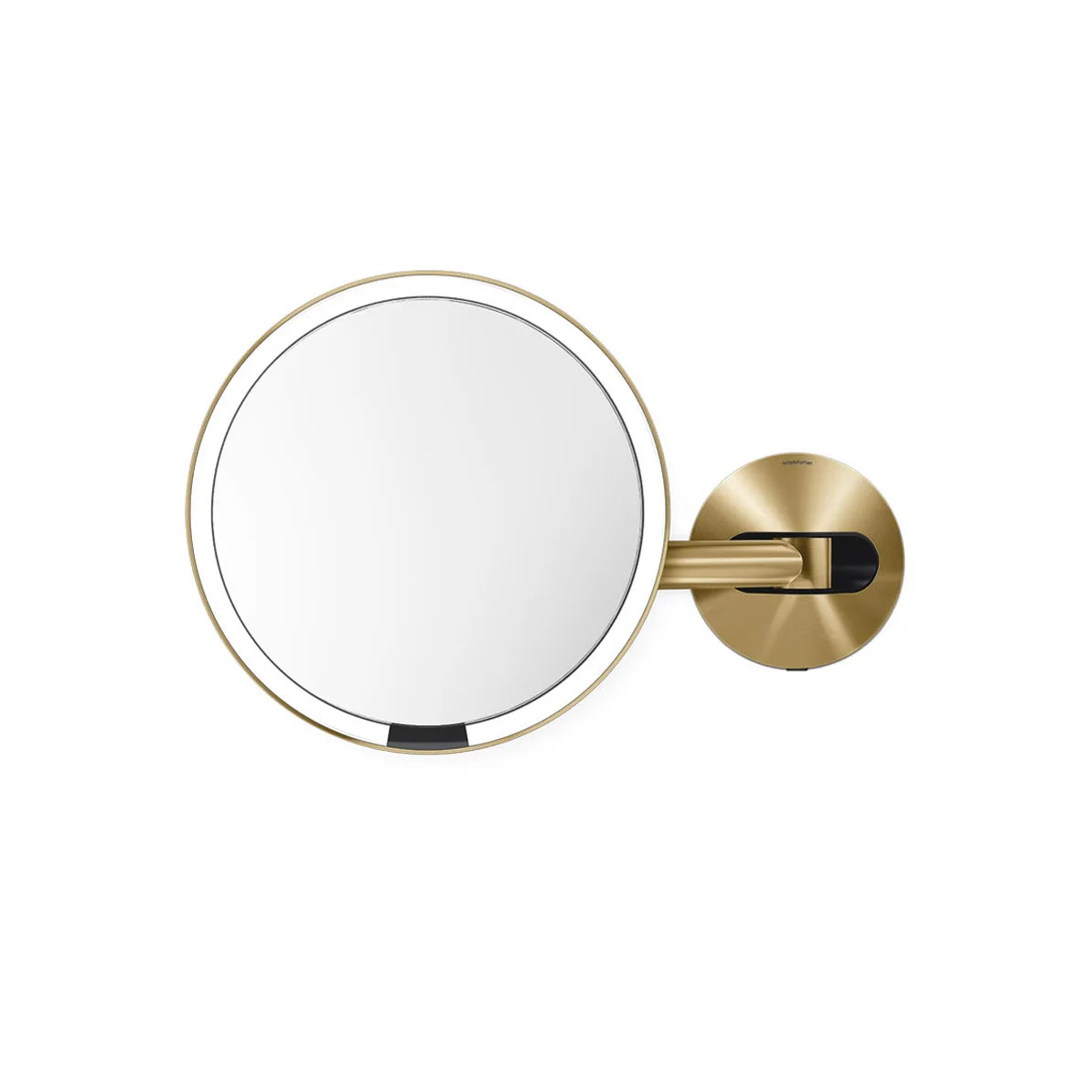 The image displays a round wall-mounted mirror with a polished gold frame and an adjustable arm. The mirror is attached to a matching gold mount, showcasing a sleek and elegant design. The minimalist appearance, combined with the luxurious gold finish, makes this mirror a perfect addition to any sophisticated bathroom or vanity space. Its adjustable feature allows for easy positioning, making it ideal for tasks such as grooming or makeup application, enhancing both functionality and style in the decor.