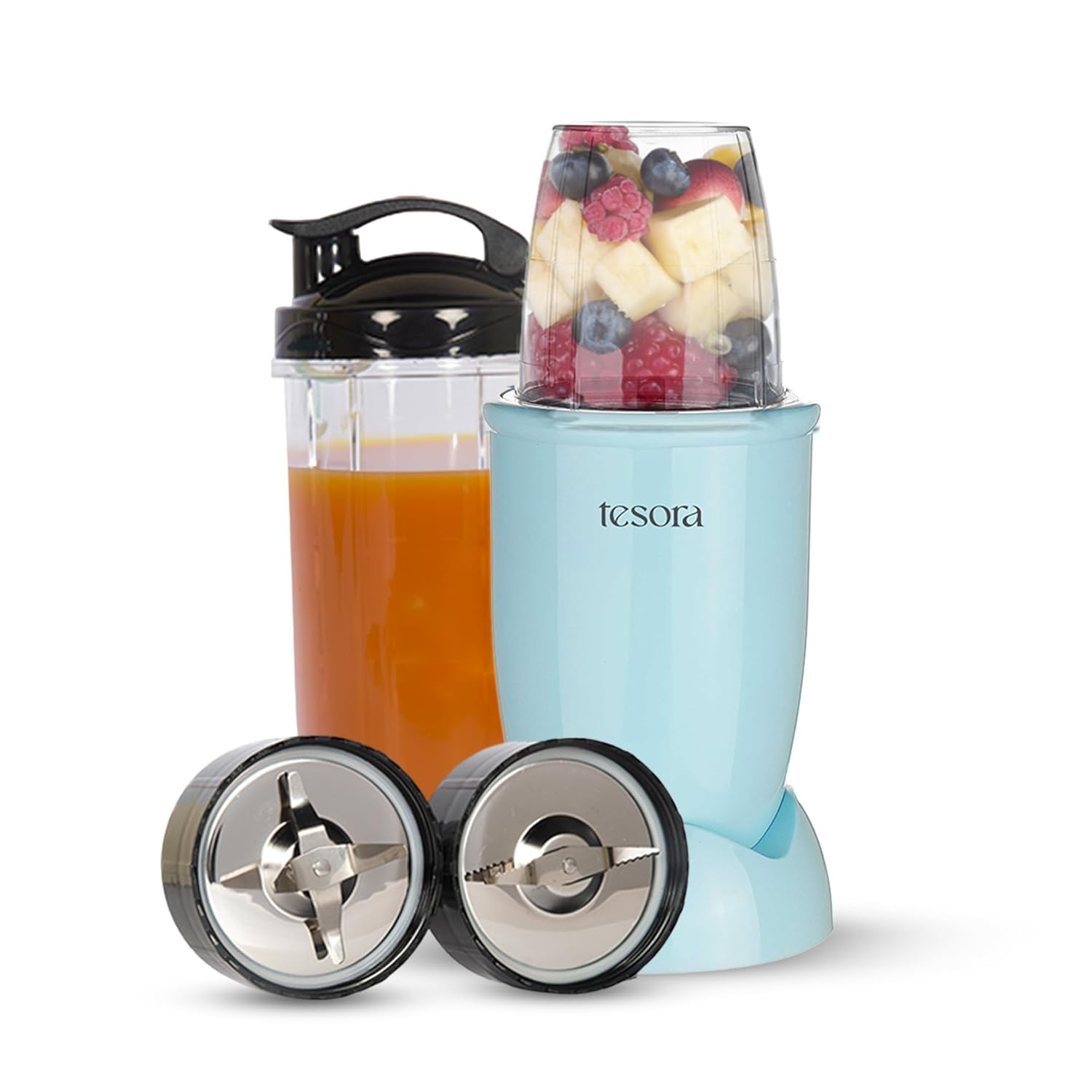 Tesora blender set in a soft blue finish, featuring a blending jar filled with vibrant mixed fruits, a clear sports bottle filled with orange juice, and two additional stainless steel blade attachments, highlighting versatility and convenience for smoothie and juice enthusiasts.