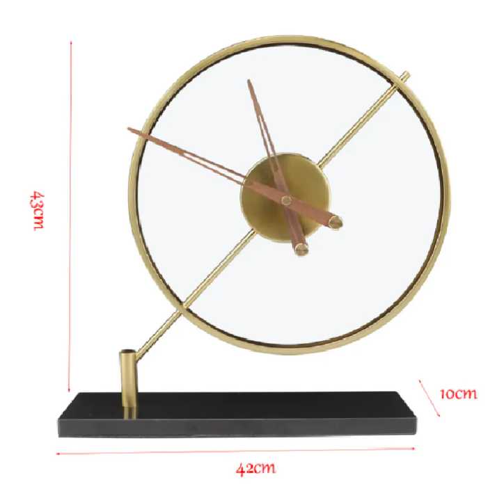 Contemporary clock with a large circular face framed in gold, featuring sleek wooden hands and supported by a black rectangular base. Dimensions are marked: 43 cm in height, 42 cm in width, and 10 cm in base thickness, emphasizing its elegant and modern design.