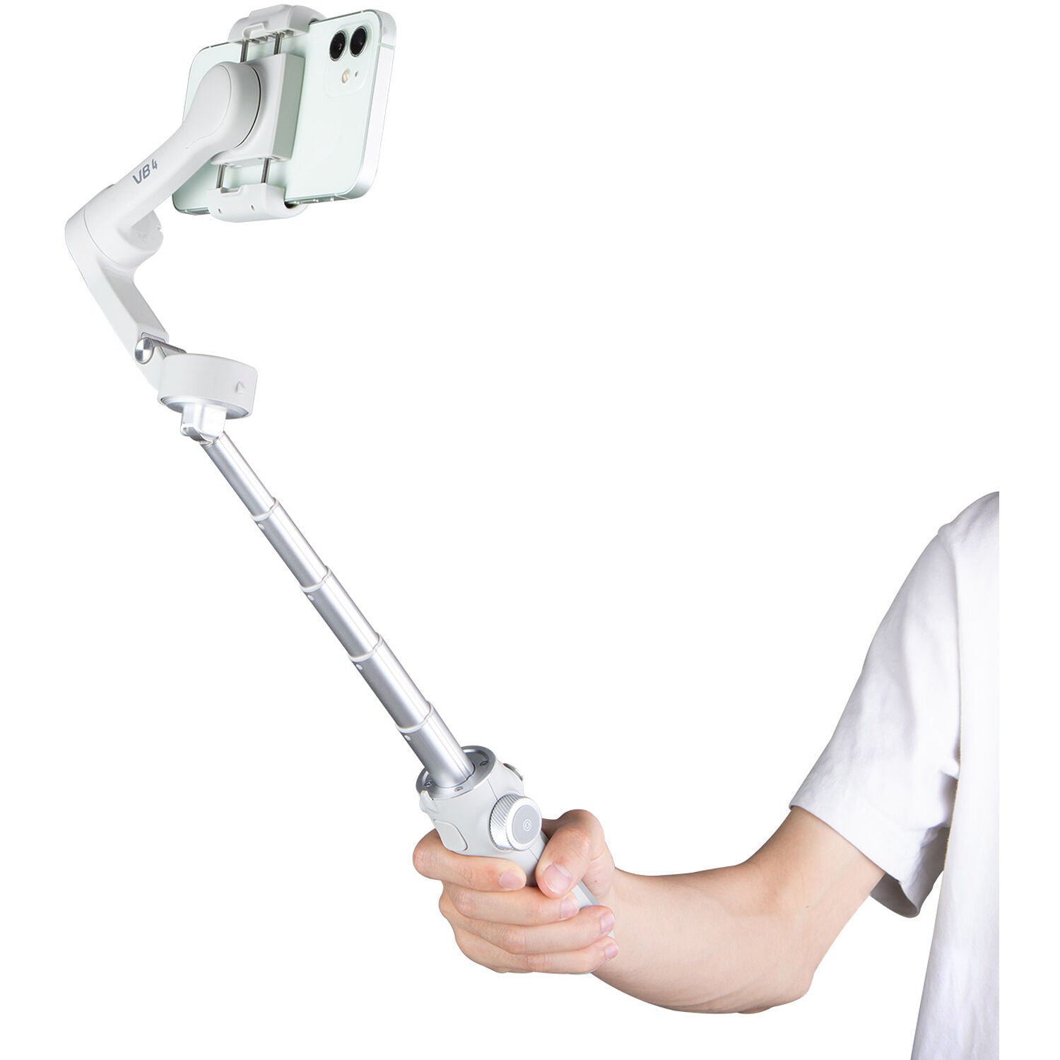 A person holding a smartphone mounted on a white handheld gimbal stabilizer with an extended telescopic arm. The gimbal features an ergonomic grip with a control panel for easy operation, allowing for smooth and stable video recording. The smartphone is securely clamped in place, making the setup ideal for vlogging, live streaming, and capturing professional-quality footage on the go. The minimalistic background emphasizes the sleek design and portability of the gimbal.