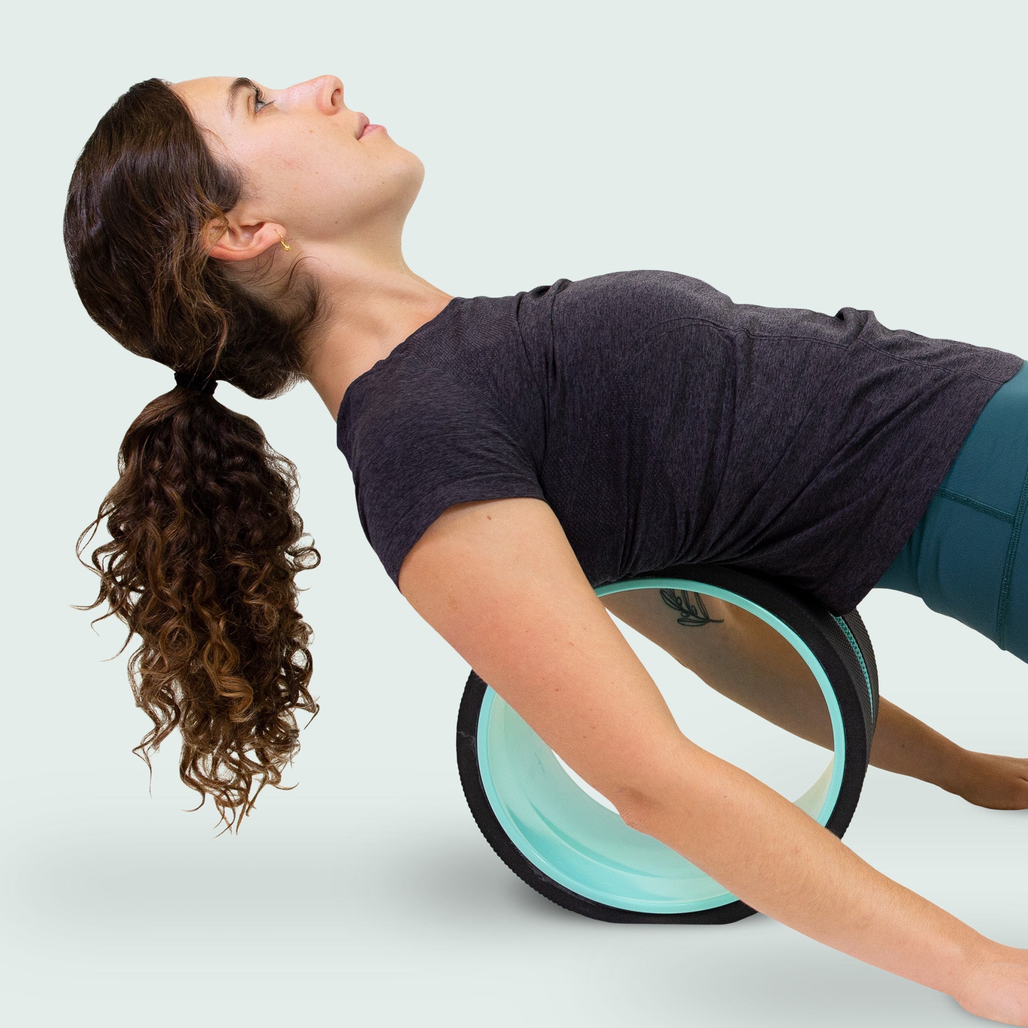 Person rolling their back on the Chirp Wheel XL Super Comfort wheel