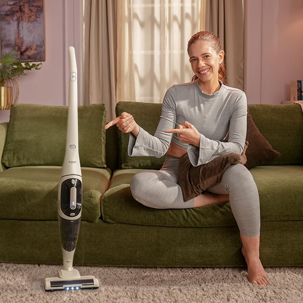 Model showcasing a versatile cordless vacuum cleaner, ideal for efficient home cleaning with sleek design.