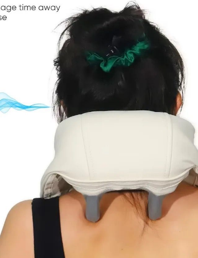 This image promotes the gentle noise reduction feature of a neck and shoulder massager, emphasizing a quiet operation that enhances the relaxation experience. The massager is shown in use, with a person wearing it around their neck, highlighting its ergonomic design.  The text indicates that the device operates at a noise level of less than 55 decibels, ensuring a peaceful massage time free from annoying noise distractions. The imagery and the accompanying text convey that this massager is designed not only