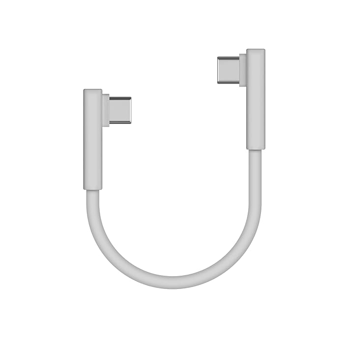 A short white USB-C to USB-C cable with 90-degree angled connectors on both ends, designed for efficient and space-saving connections, ideal for charging and data transfer in compact setups.