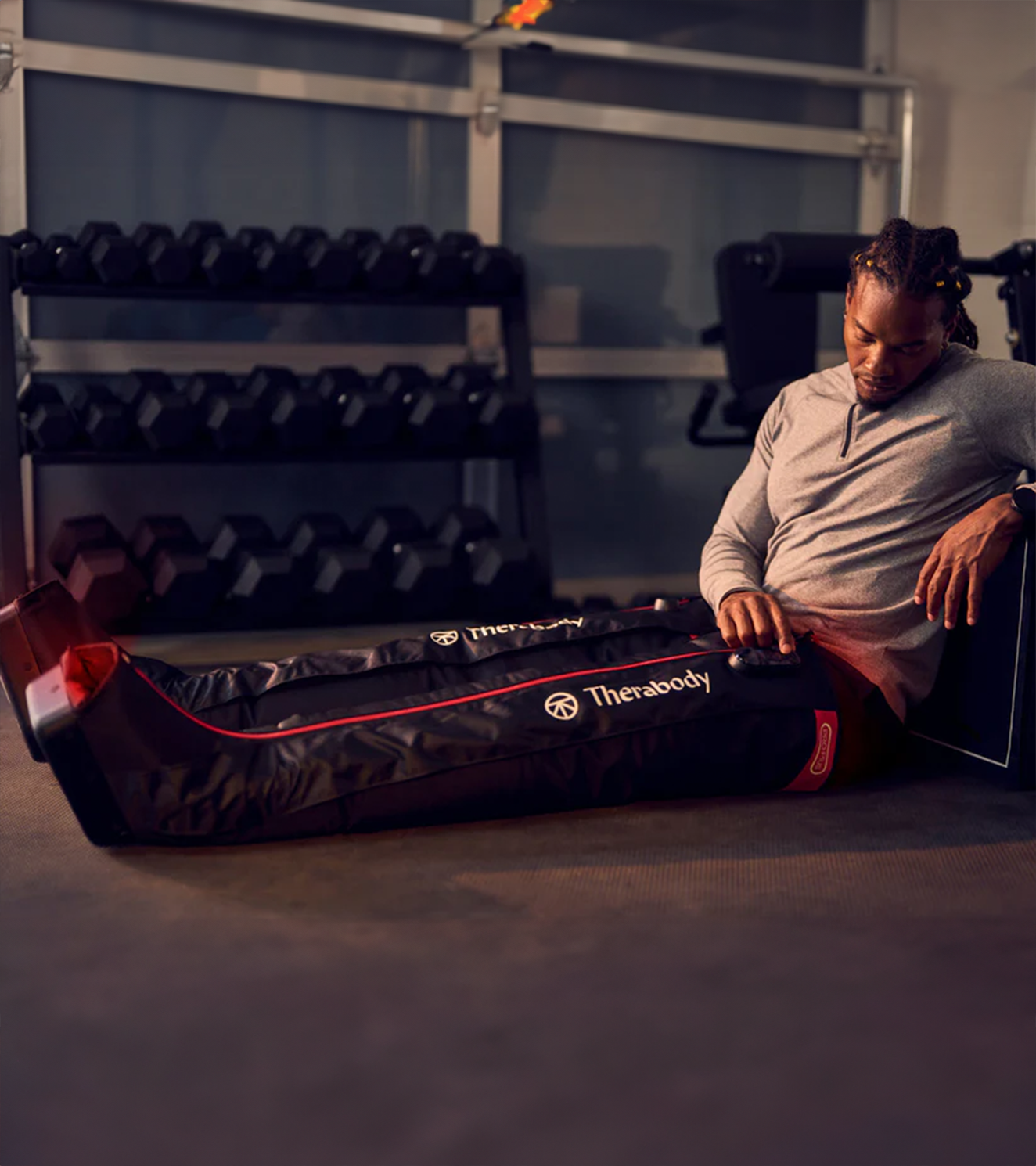 Athlete recovering in JetBoots PRO Plus after a gym session
